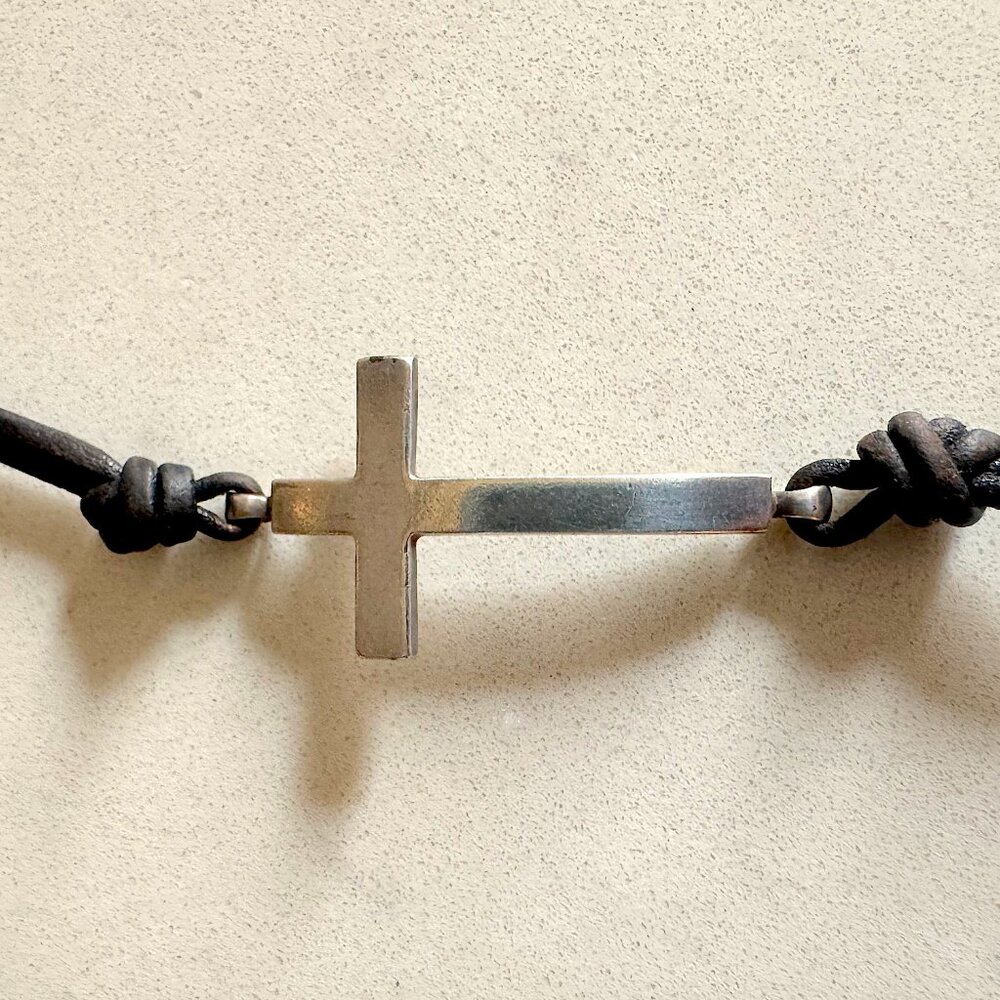 Me & Ro Sterling Silver Cross Bracelet on Black Leather Band.